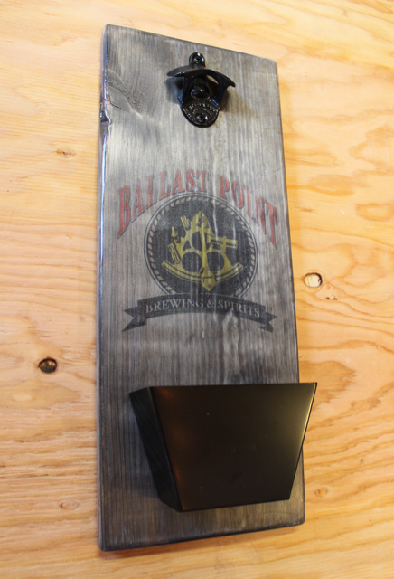 wall-mount bottle opener with oxidized wood plank