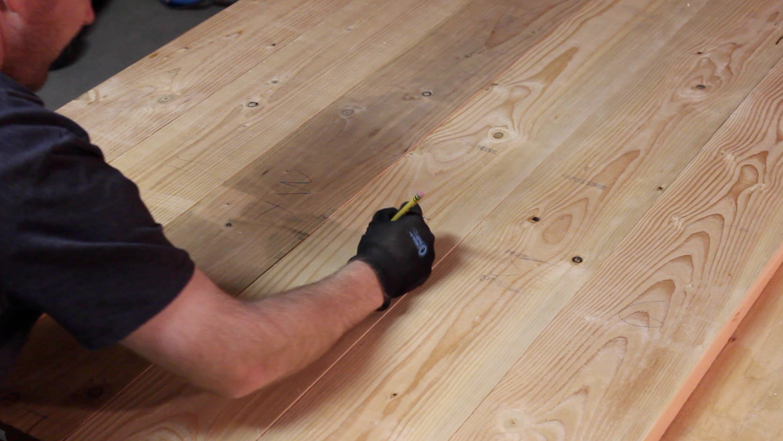 marking where to drill pocket holes to join table planks
