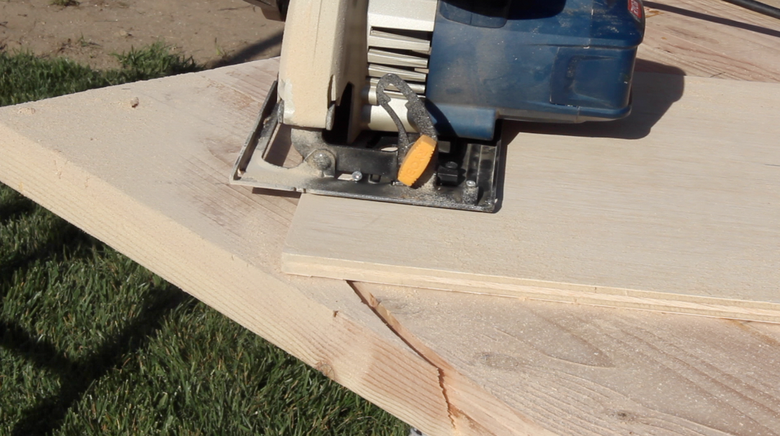 Using a circular saw to cut the rounded ends of the table top