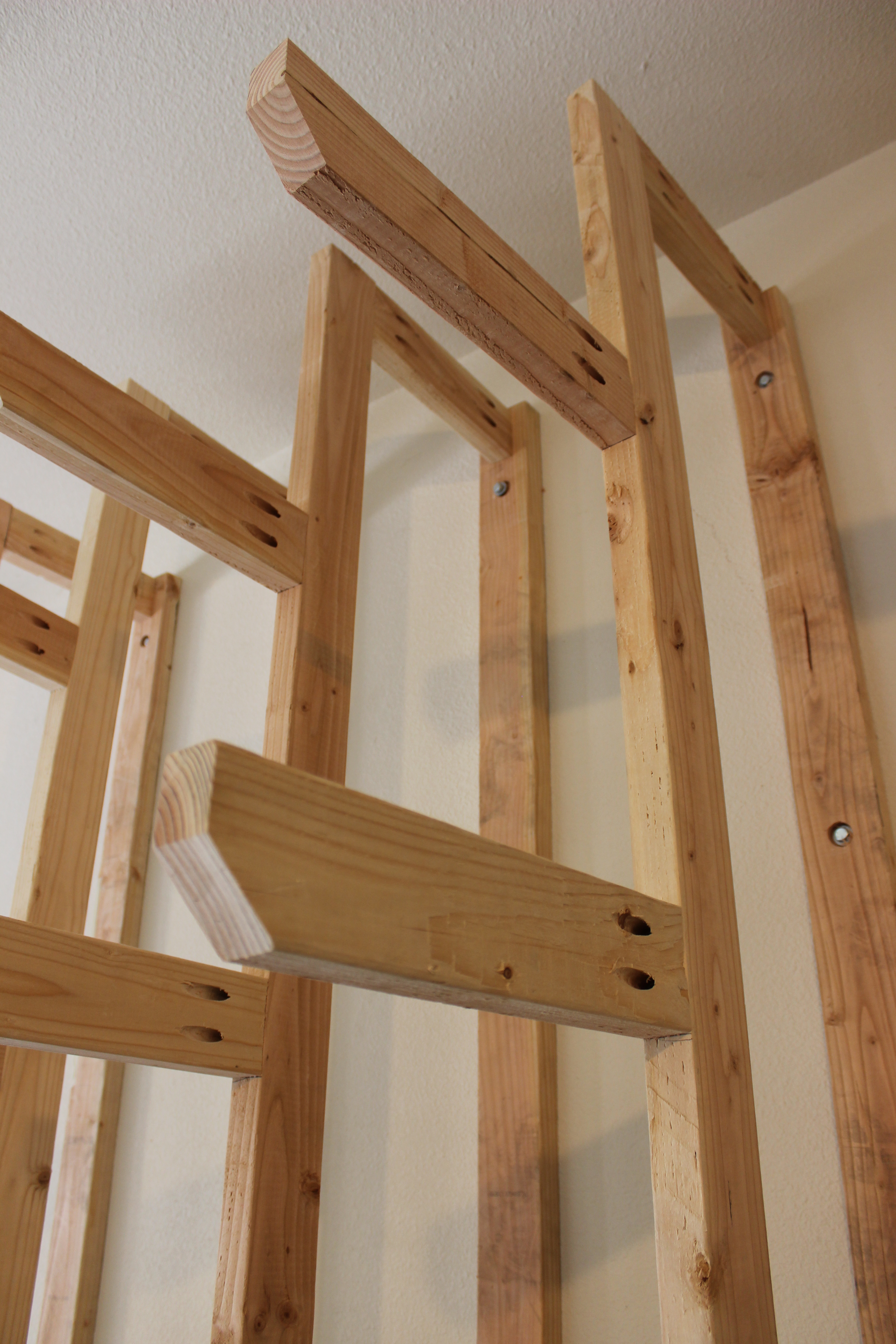 arms of lumber rack attached by pocket screws