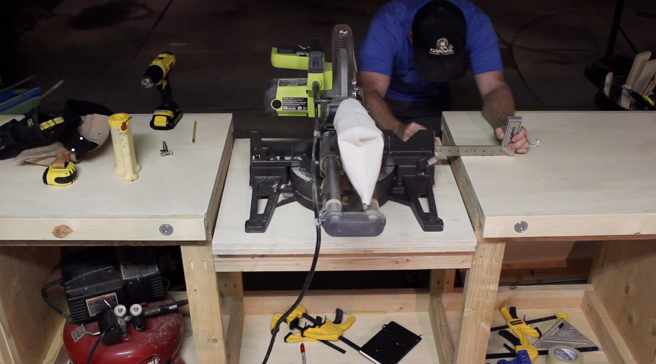 attaching the miter saw to the workbench insert