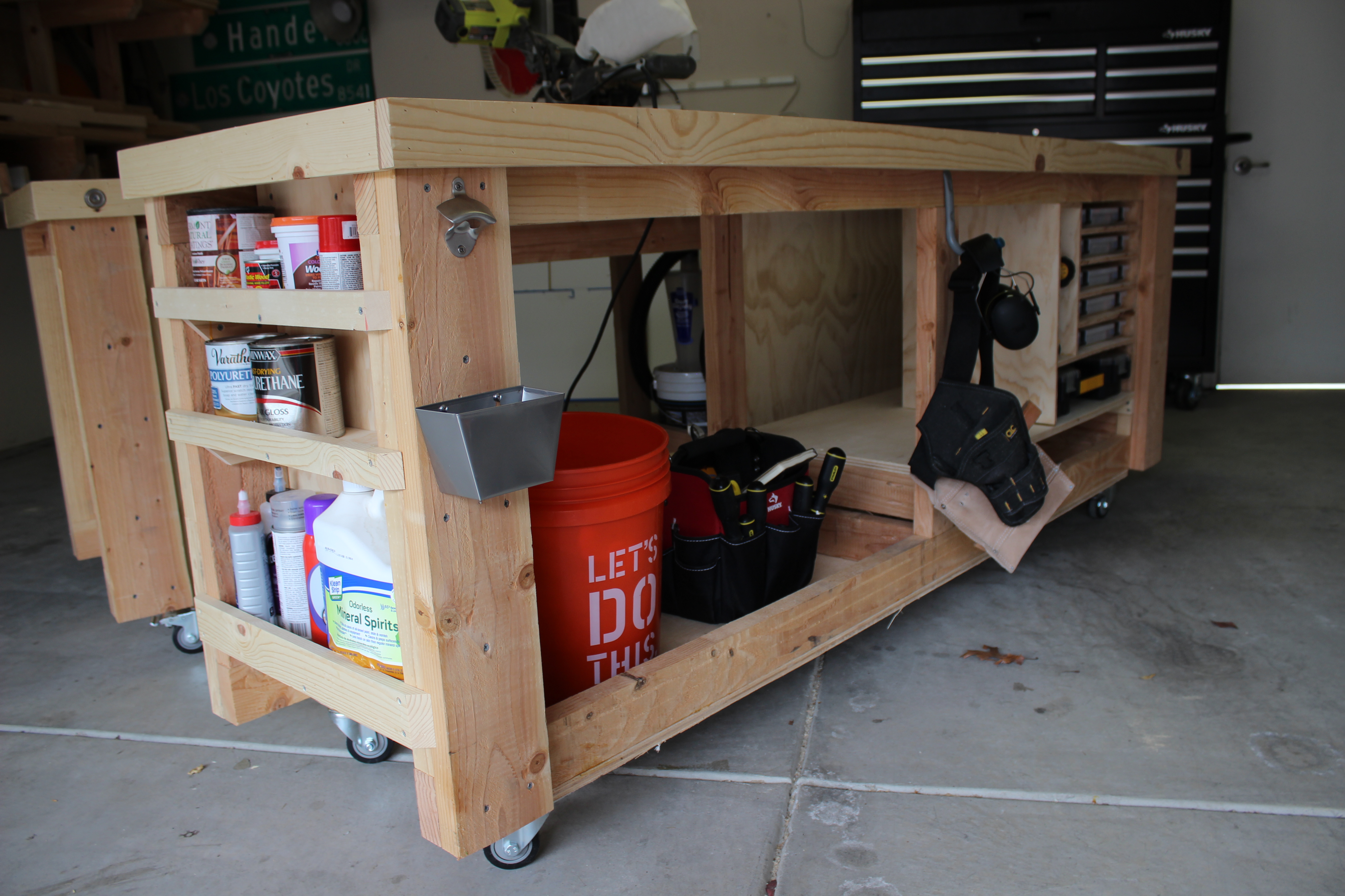 Side view of mobile workbench with shelves and storage