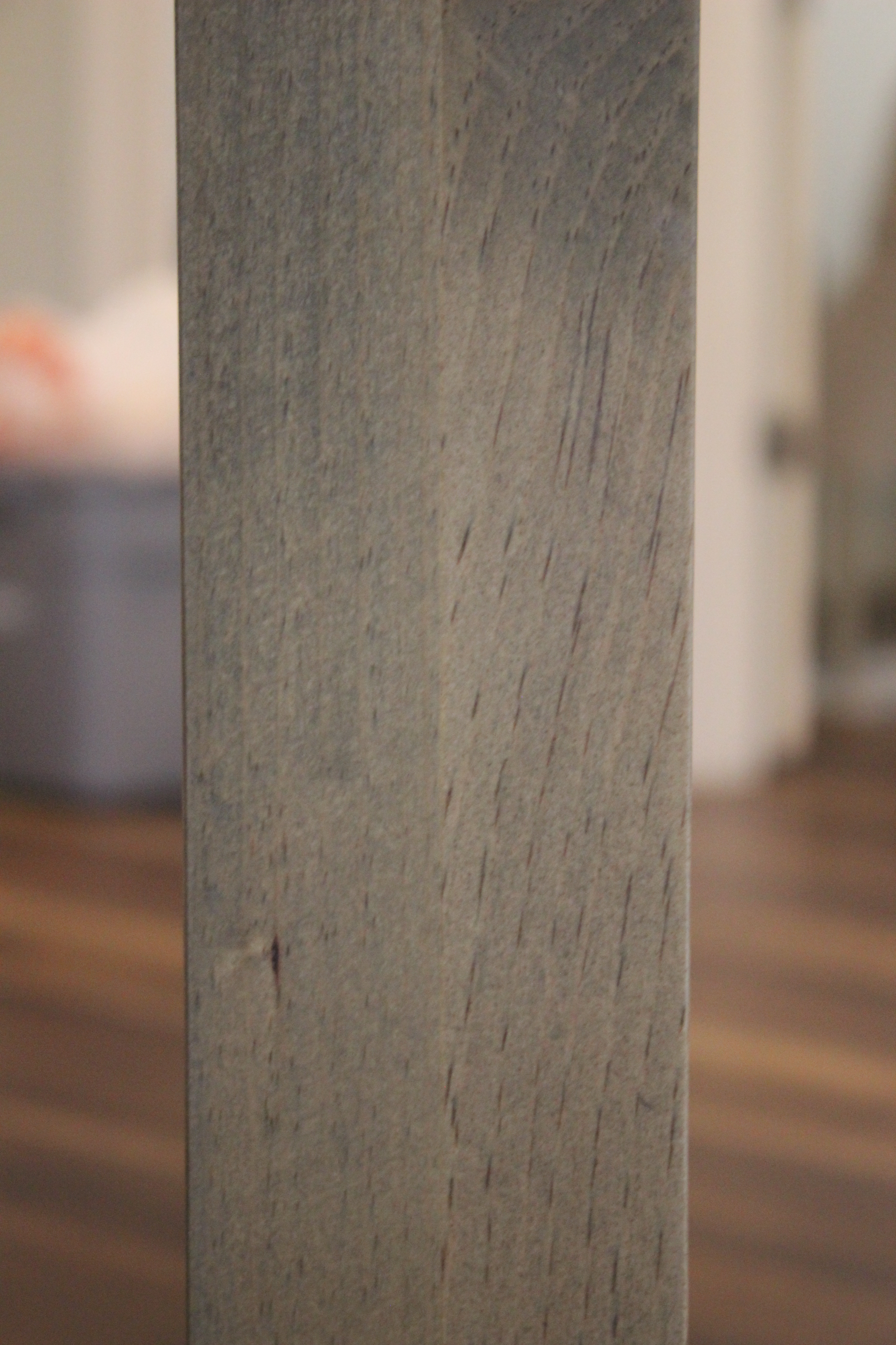 close-up of pine table leg which was laminated from two boards